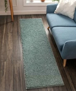 Well Woven Plain Light Blue Modern Solid Rug