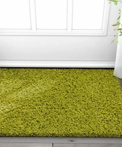 Well Woven Shag Plain Green Solid Rug