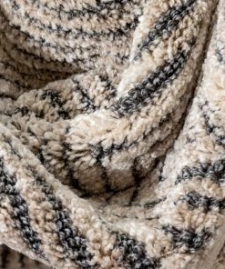 Well Woven Hugo Tribal Geometric Beige Distressed High-Low Rug