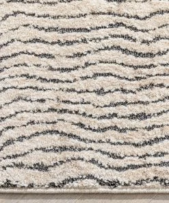 Well Woven Global Mateo Tribal Geometric Coastal Lines Beige Distressed High-Low Rug
